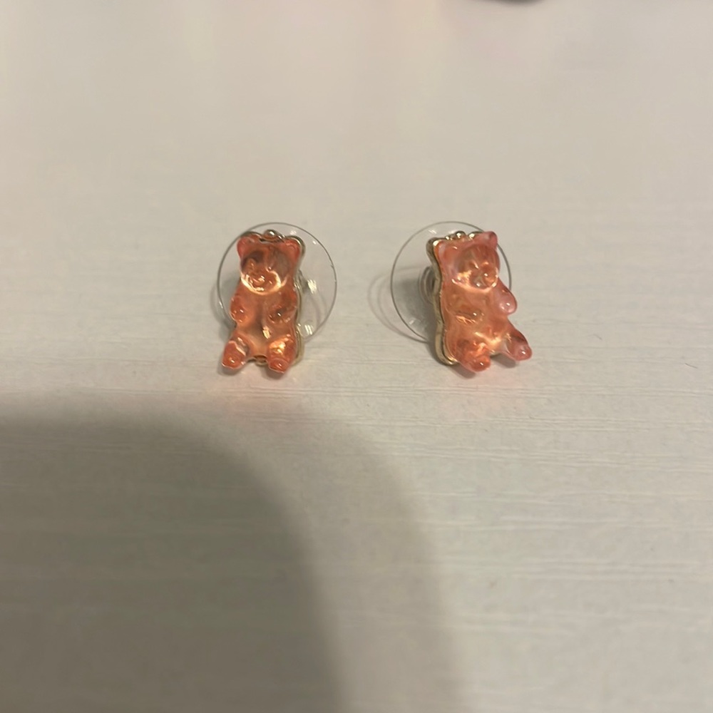 Pink gummy bear earrings.
